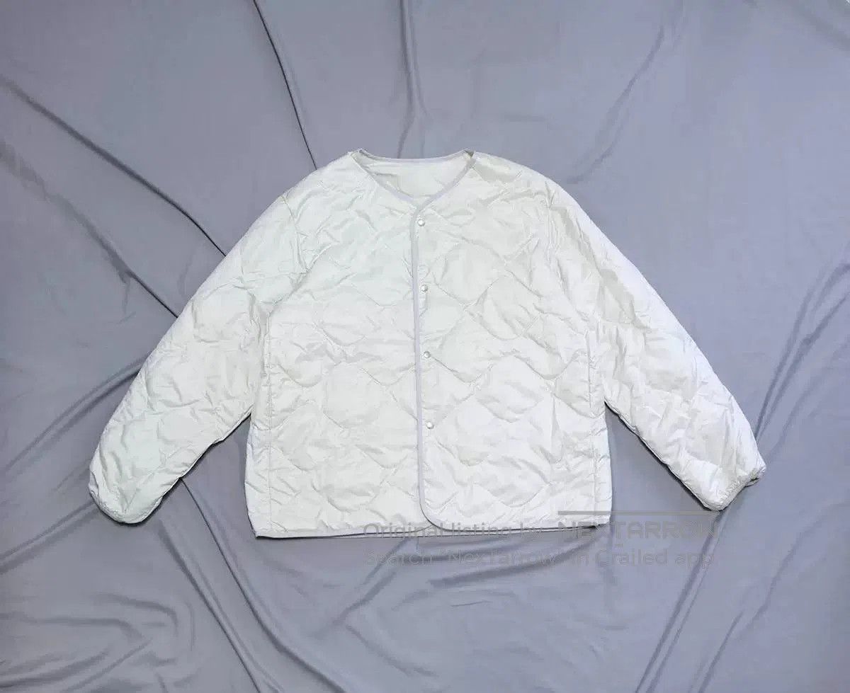 Nanamica nanamica reversible down cardigan in ecru. Size US M / EU 48-50 / 2 - 4 Thumbnail