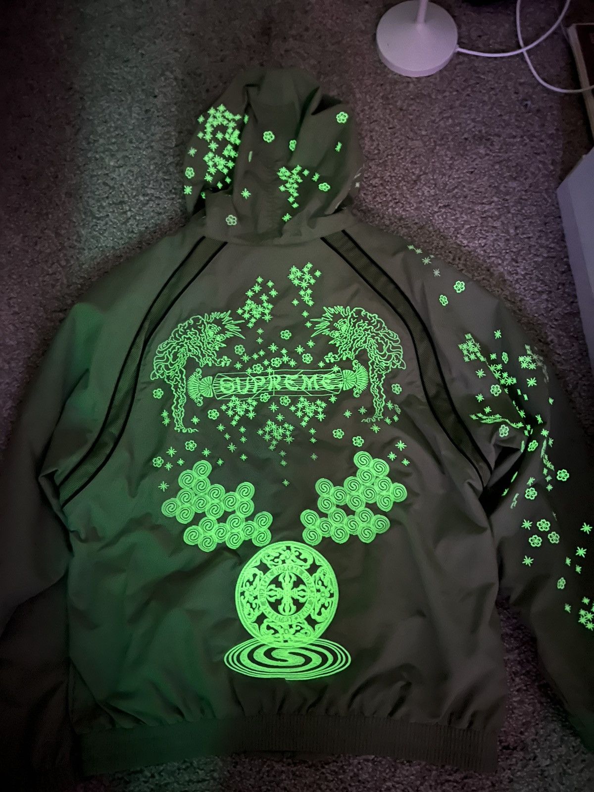 Supreme Supreme AOI glow in the dark track jacket | Grailed