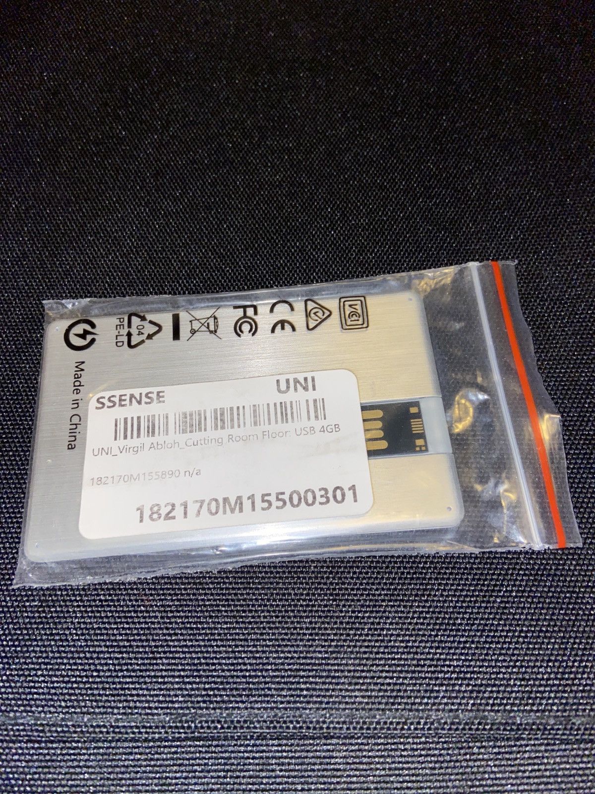 image of Virgil Abloh C/o Ssense “Cutting Room Floor” Usb 4Gb in Silver, Men's