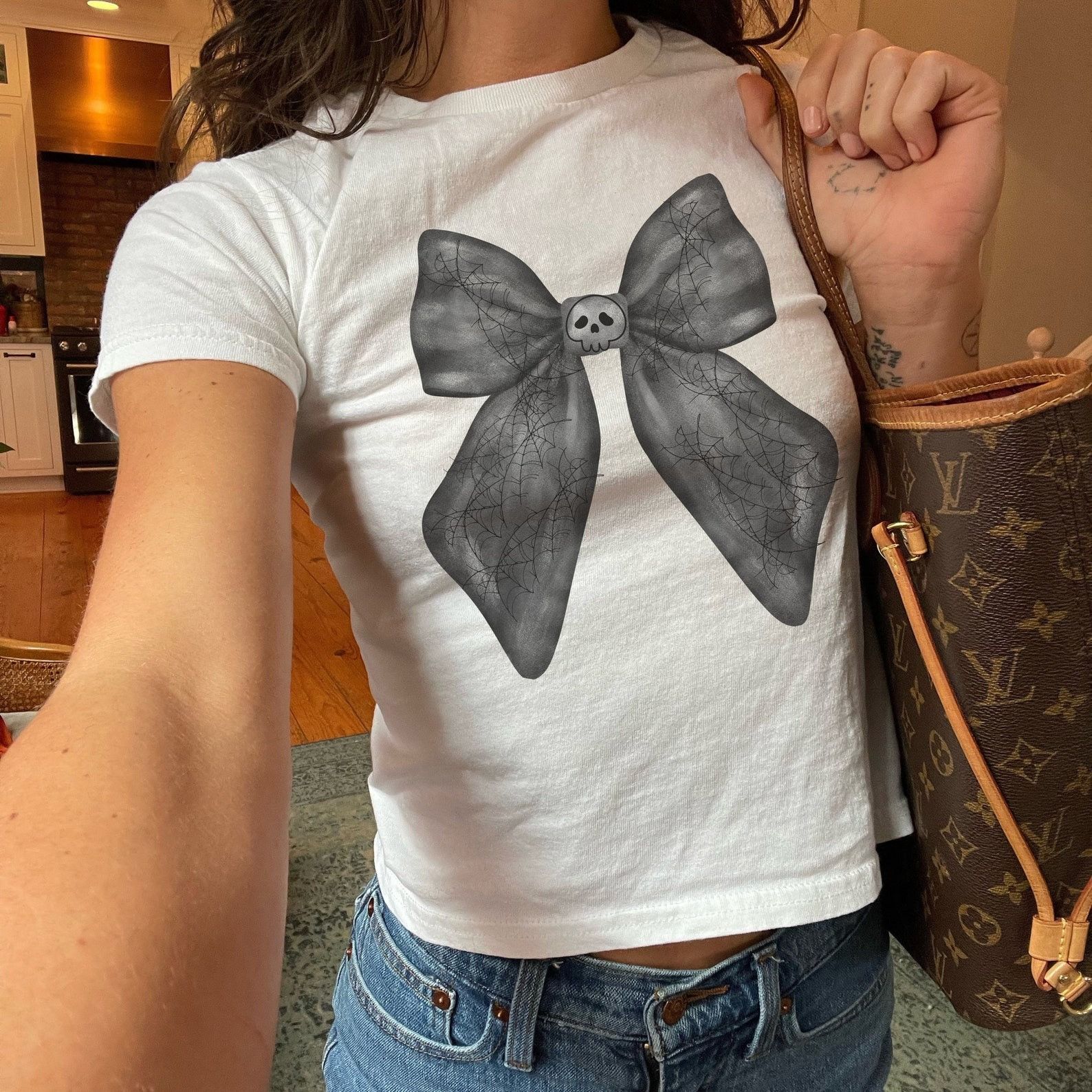 Designer × The Unbranded Brand Coquette Black Bow Halloween Baby Tee Size M / US 6-8 / IT 42-44 - 1 Thumbnail