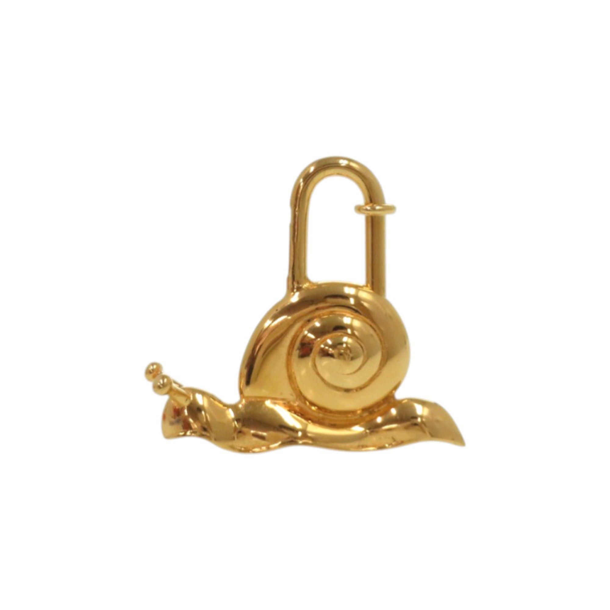 Like new Hermès snail cadence charm 1995 ANNÉE DE LA ROUTE metal gold 1798HERMES