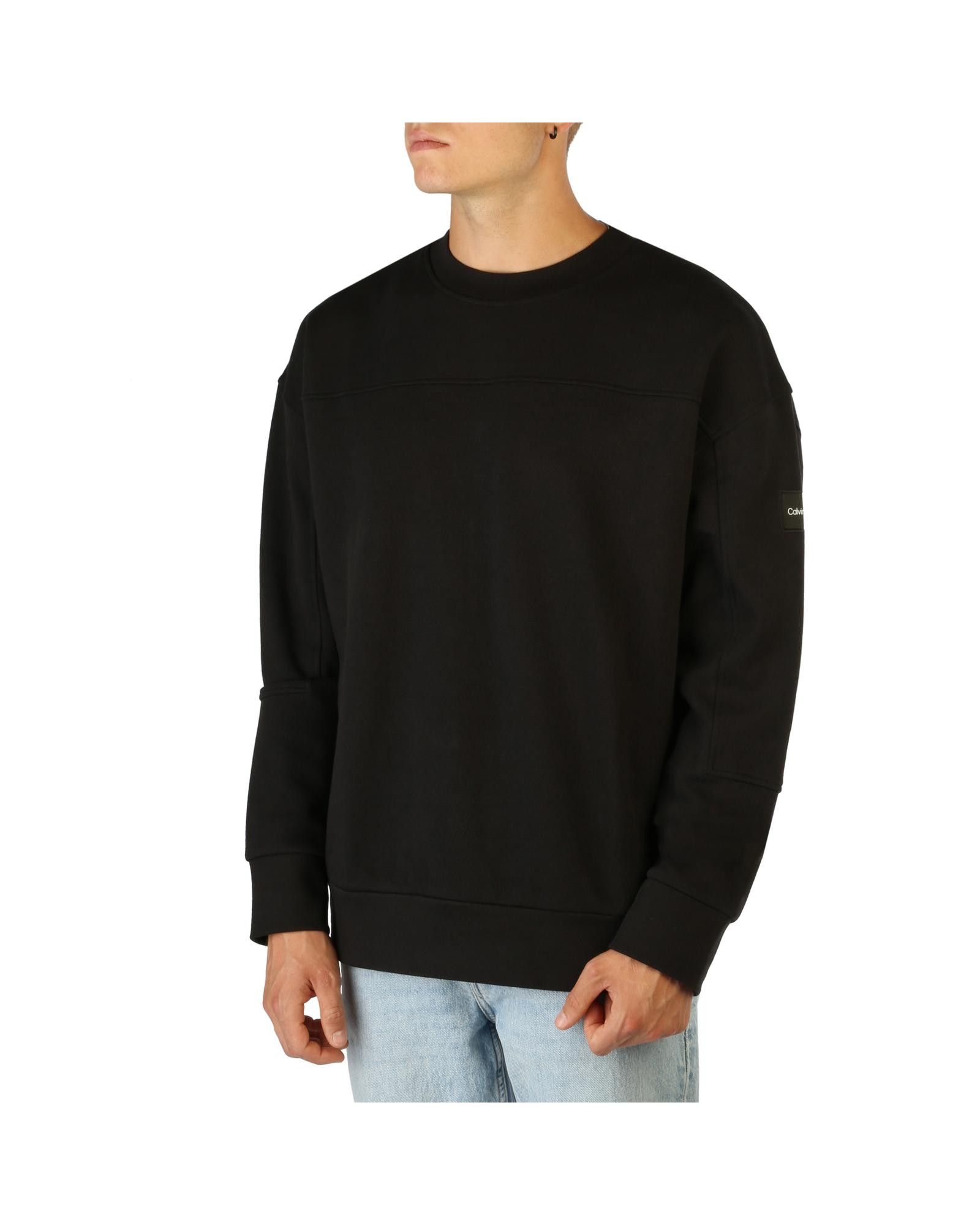image of Calvin Klein Solid Colour Cotton Blend Round Neck Sweatshirt in Black, Men's (Size Small)