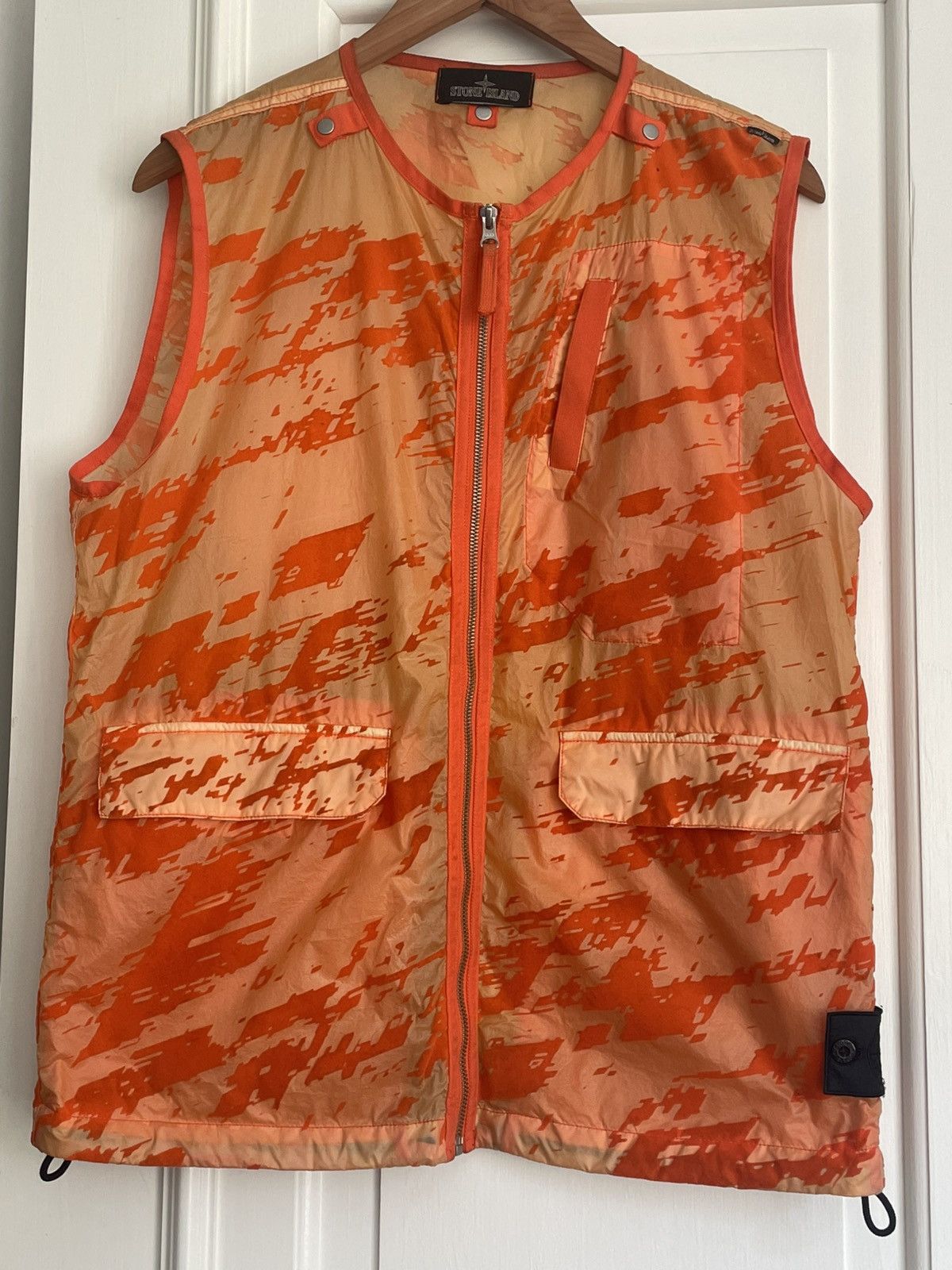Neon orange tech vest from Shadow Project