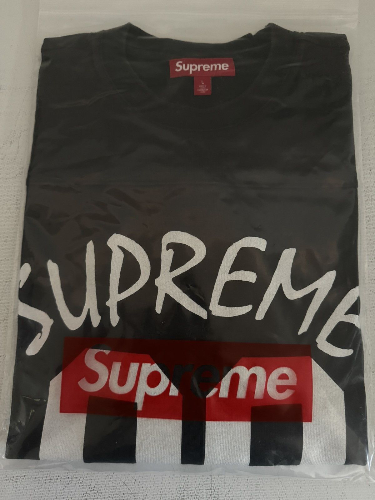 Supreme Supreme 99 L/S Football Top Black L | Grailed