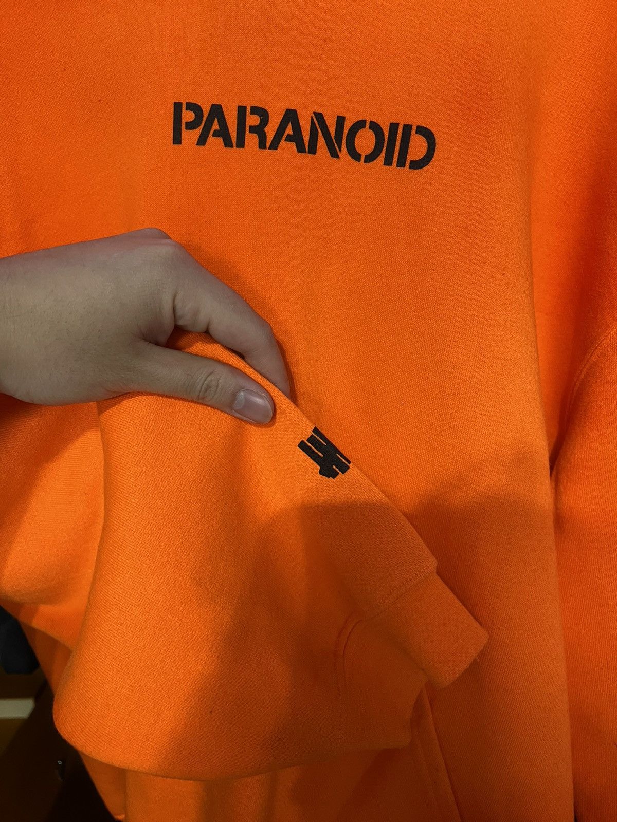 Anti Social Social Club × Undefeated Anti Social Social Club x Undefeated Hoodie - Orange. Size L Size US L / EU 52-54 / 3 - 4 Thumbnail