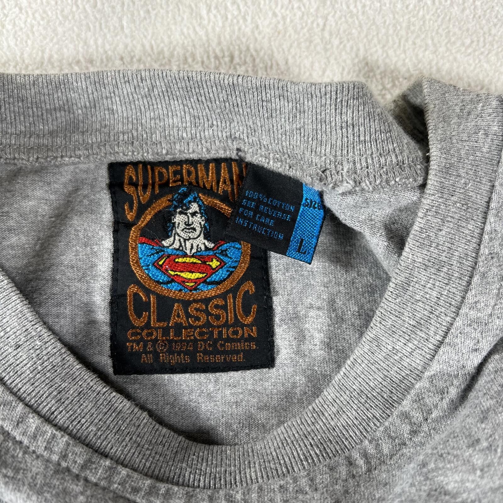 DC Comics Vintage 1994 DC Super Heros Superman Graphic Tee Size US L / EU 52-54 / 3 - 6 Thumbnail