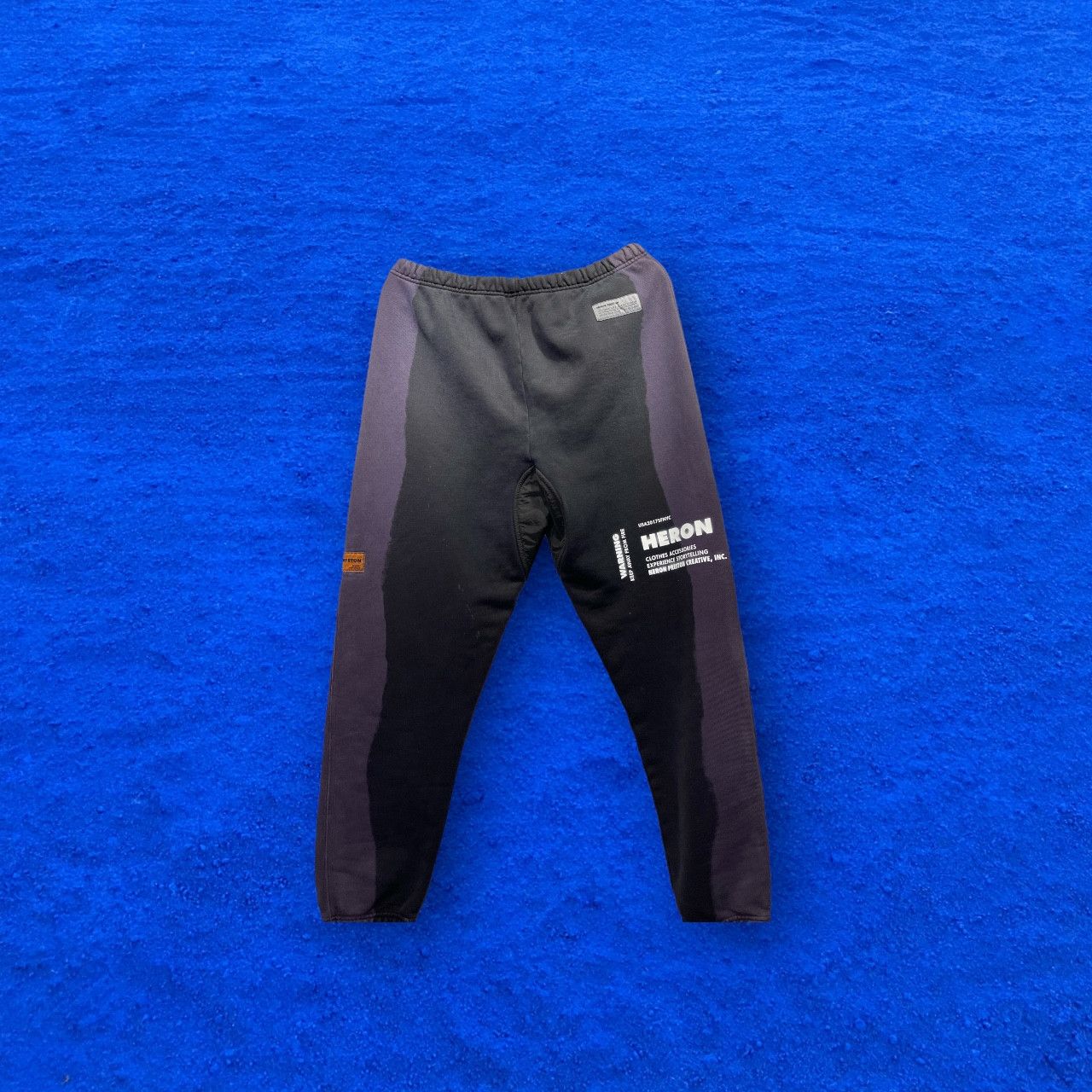 image of Heron Preston X Cat Sweatpants in Black, Men's (Size 34)