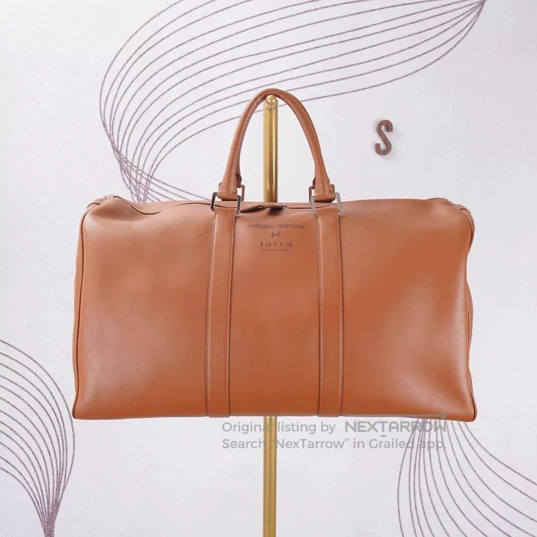 A testoni Leather Travel Bag.