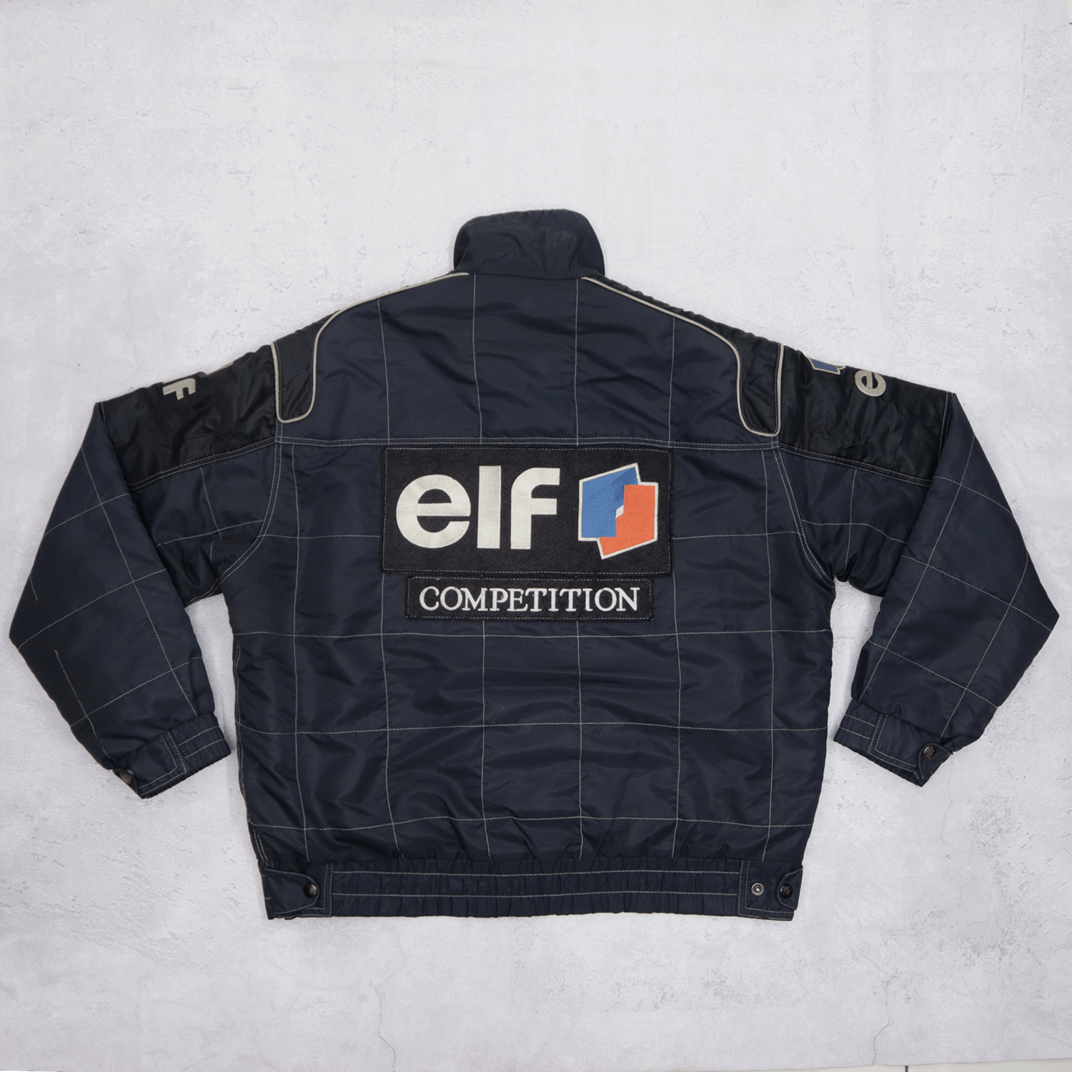 Sports Specialties × Vintage ELF Competition Bomber Racing Team ...