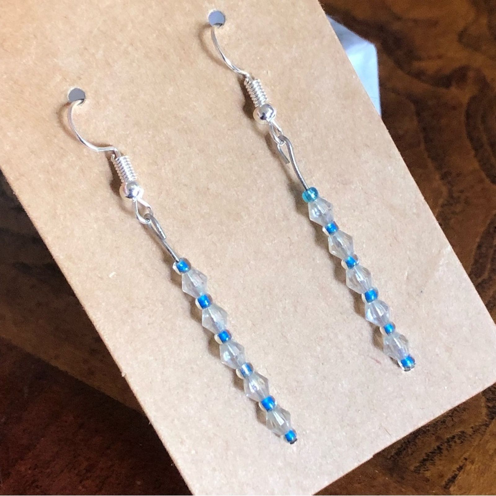 Handmade Handcrafted clear bicone and blue beaded dangle earrings Size ONE SIZE - 1 Thumbnail