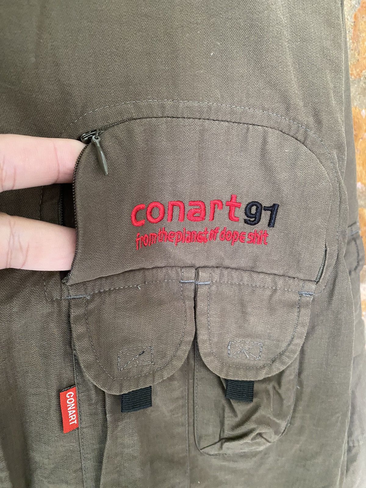 General Research × JNCO 1990s CONART utility multi pocket cargos jacket Size US L / EU 52-54 / 3 - 11 Thumbnail