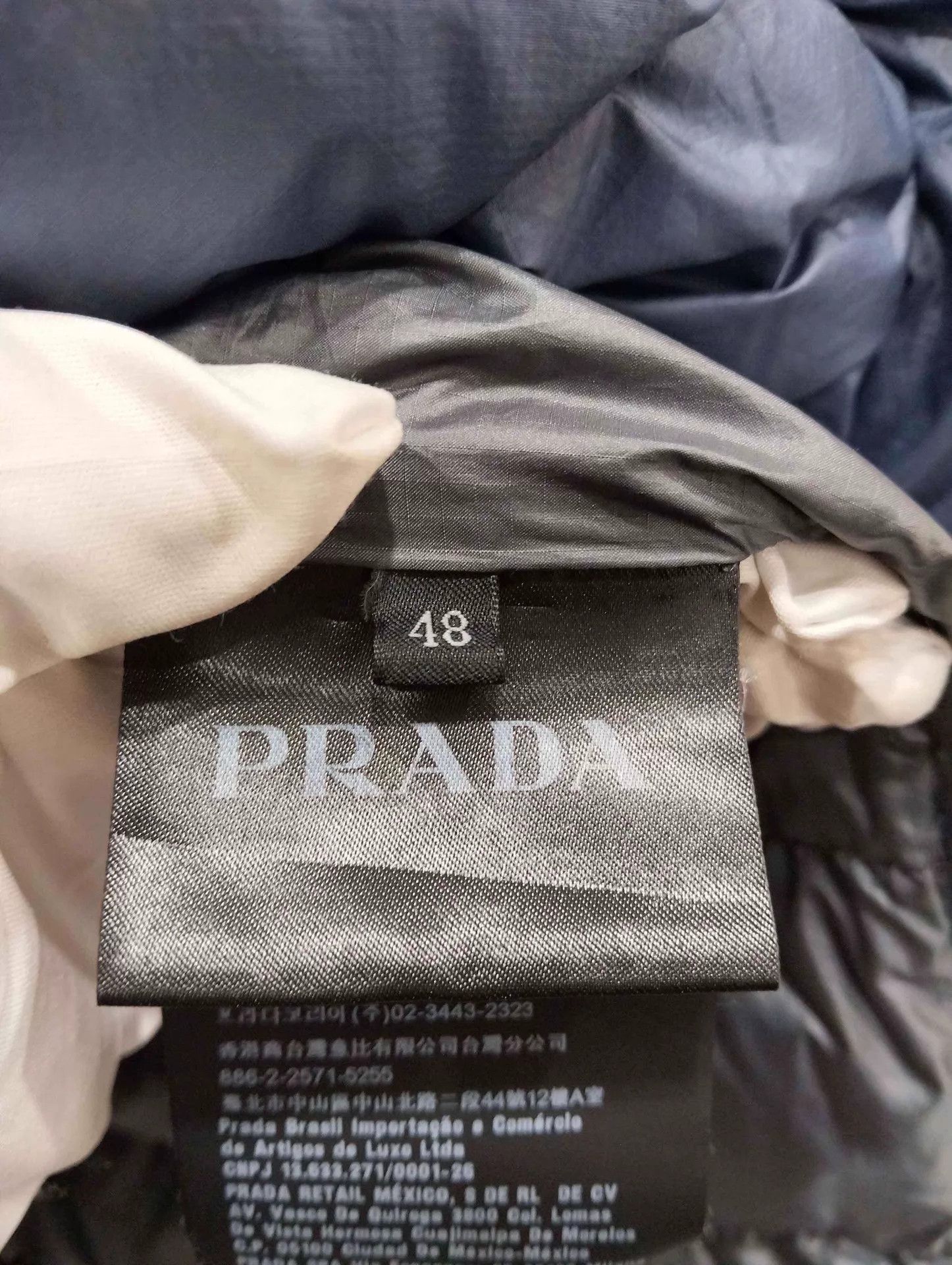 Prada Prada solid triangle logo stand collar puffer size 48 Size US M / EU 48-50 / 2 - 6 Thumbnail