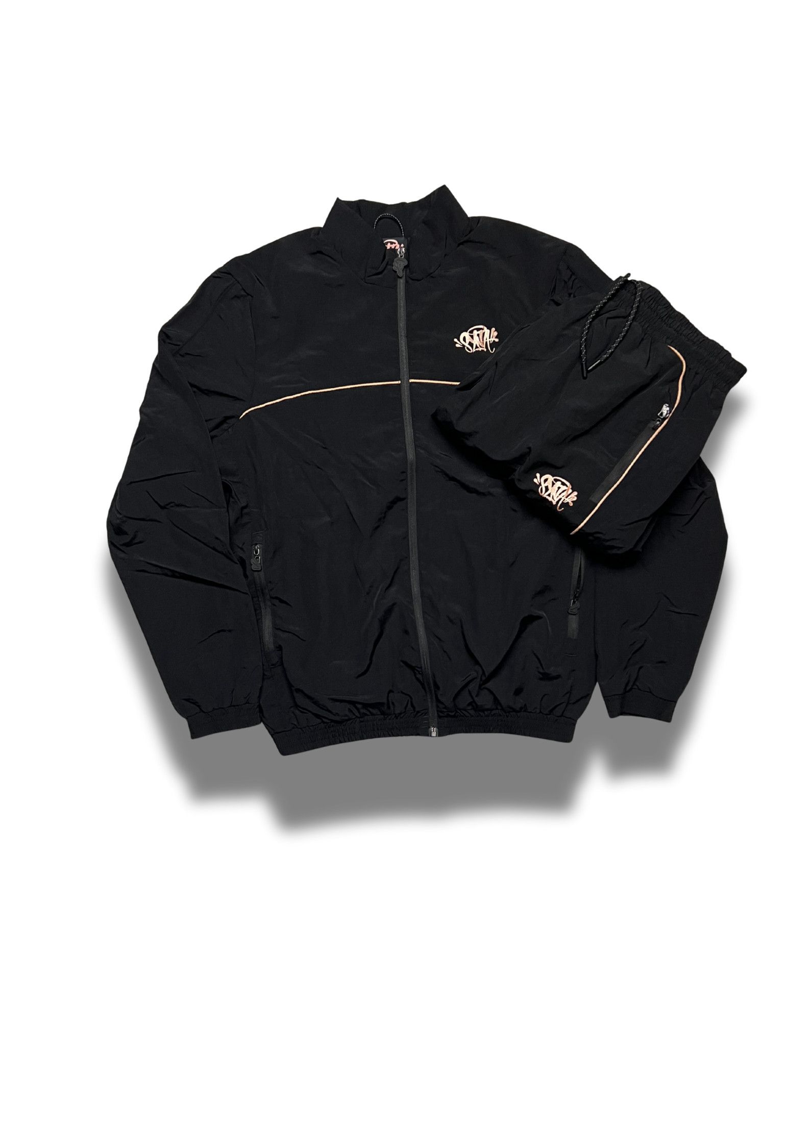 Syna World Syna World Shell Tracksuit “BLACK / GOLD” CHECK Description Size US S / EU 44-46 / 1 - 2 Thumbnail