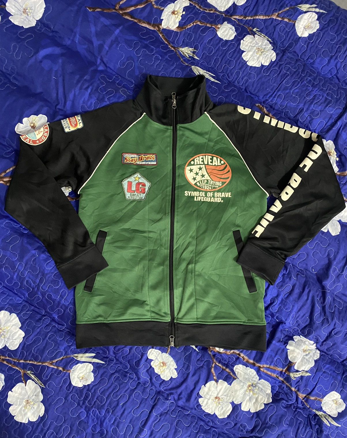 VINTAGE SYMBOL BRAVE LIFEGUARD REVEAL TRACKTOP