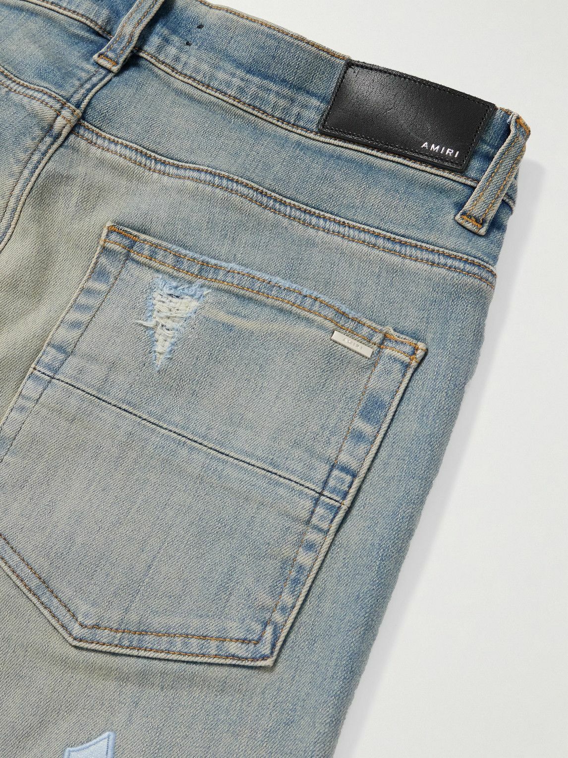 Amiri oc11z0825 Logo-Appliquéd Panelled Distressed Jeans in Blue Size US 29 - 6 Thumbnail
