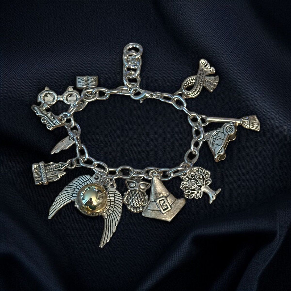 Other Silver tone charm bracelet with assorted charms Size ONE SIZE - 1 Thumbnail