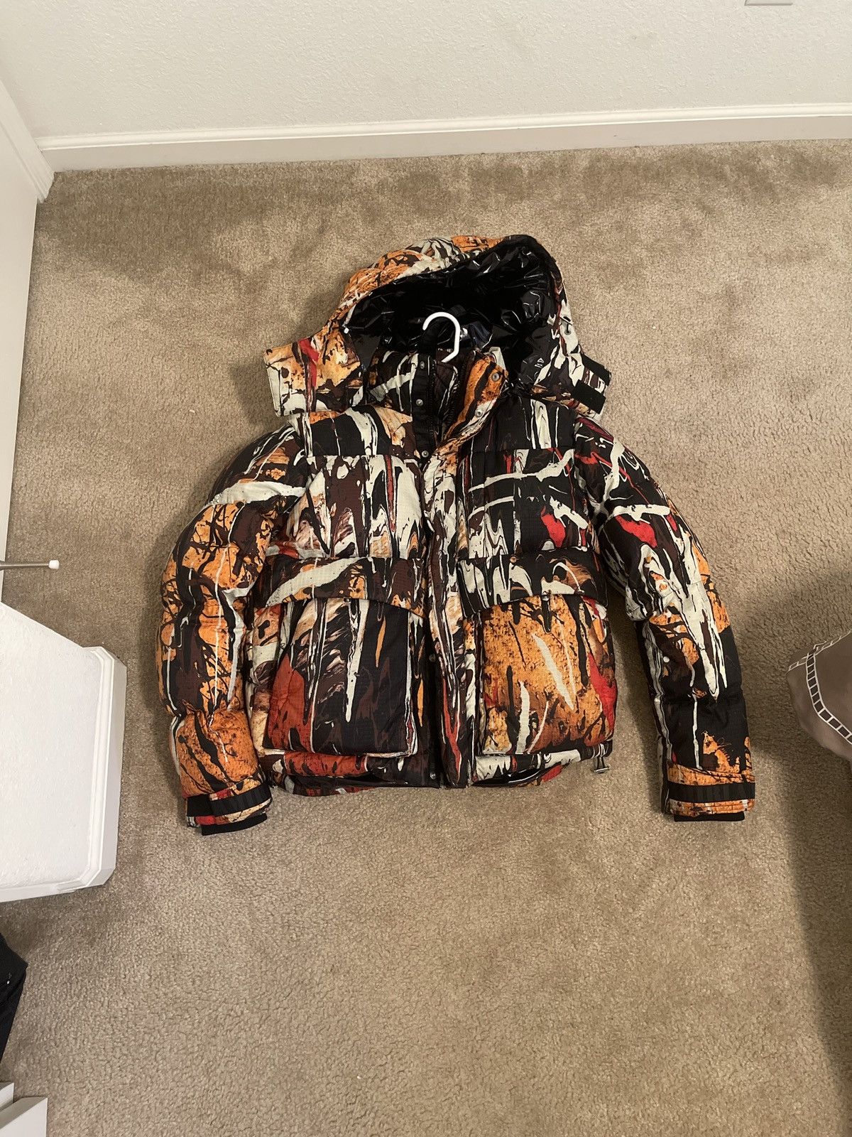 image of Amiri Splatter Down Puffer in Orange, Men's (Size Small)