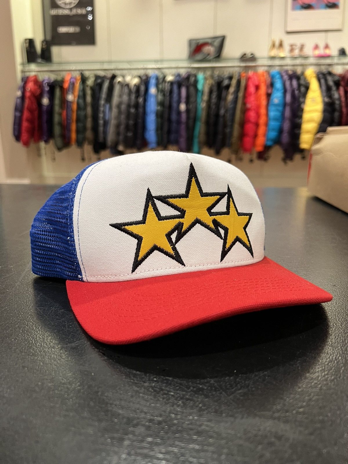 image of Amiri Star Patch Trucker Hat in Blue Red, Men's