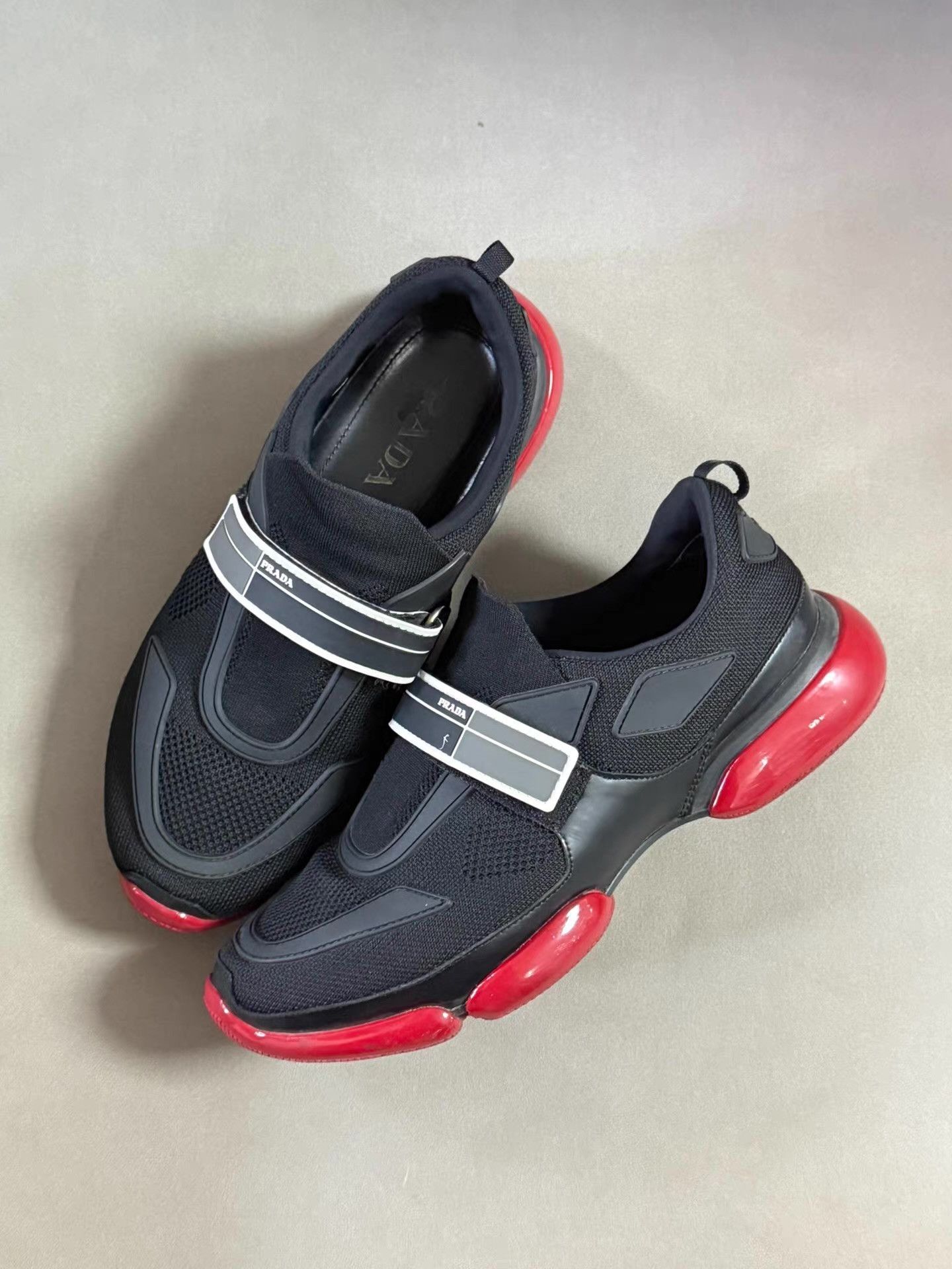 Prada Prada Cloudbust Sneakers black/red 20G 064 | Grailed