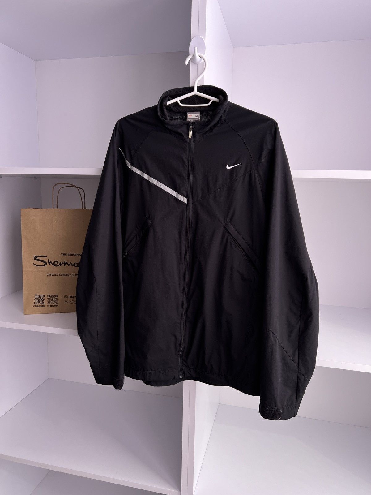 Vintage Nike Light 90s style windbreaker jacket