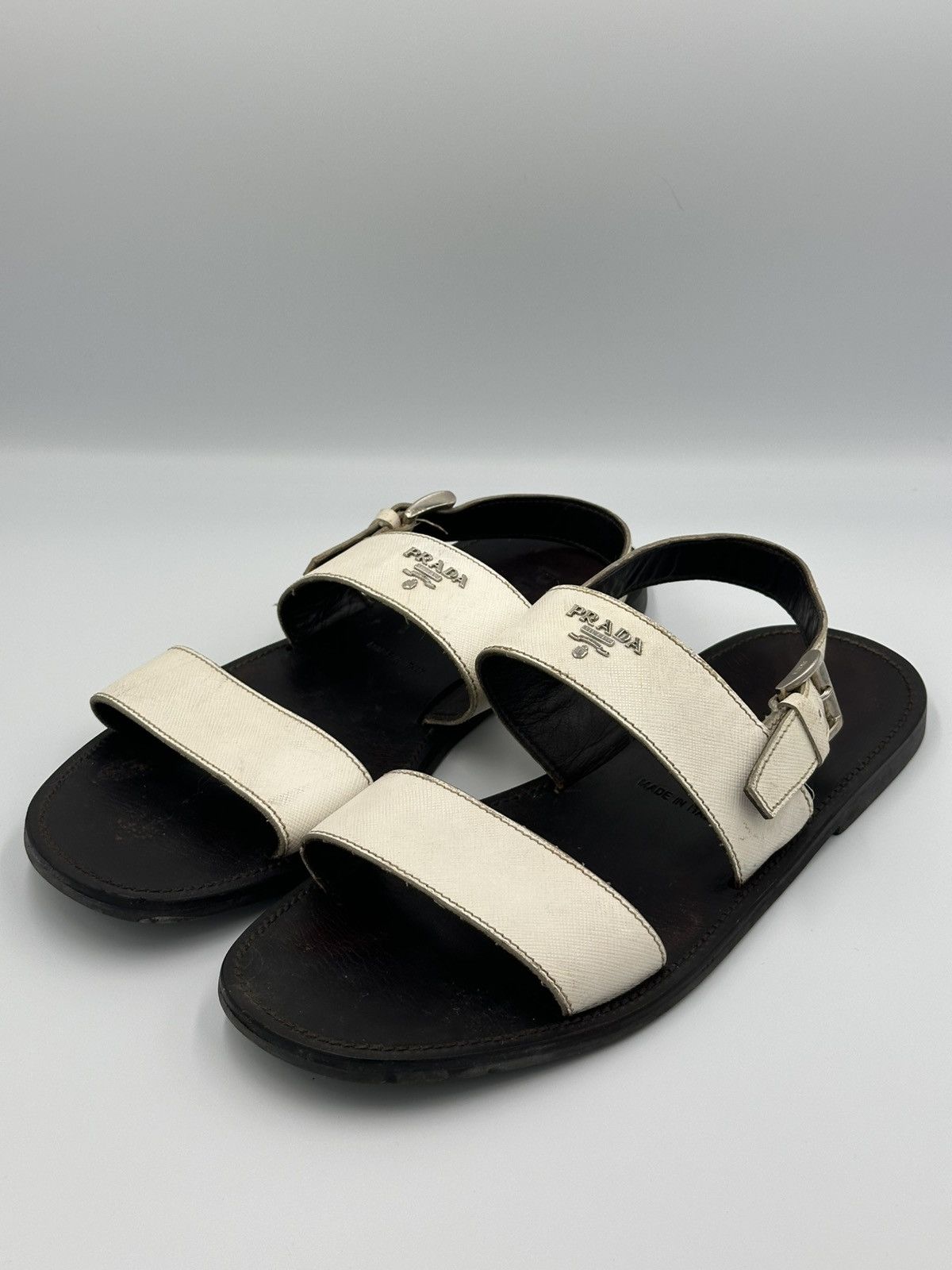 Prada Prada leather white sandals with metal logo Size US 7 / EU 40 - 1 Thumbnail