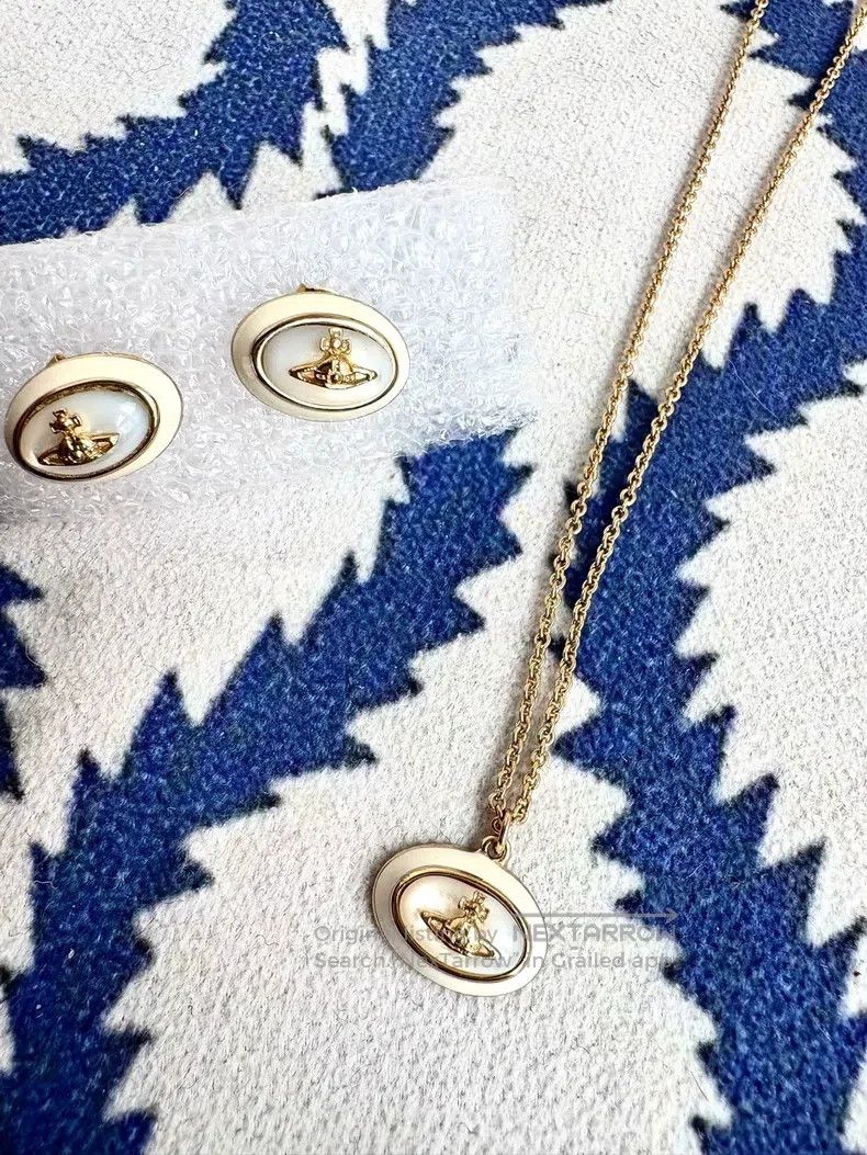 Vivienne Westwood Vivienne Westwood White gold mother-of-pearl Saturn neckla Size ONE SIZE - 1 Thumbnail