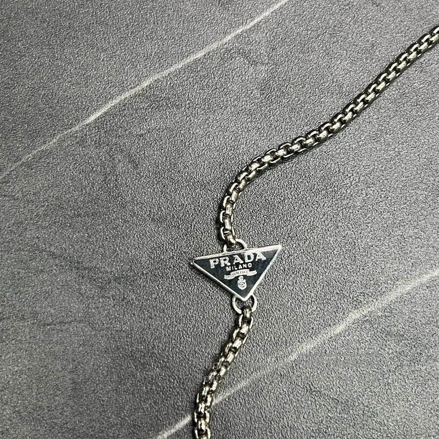 Prada Prada Metal Triangle Logo Headphone Chain. Size ONE SIZE - 2 Thumbnail