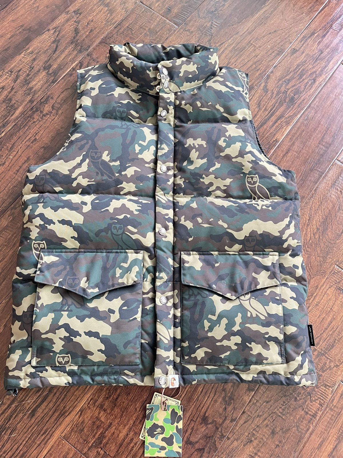 image of Bape X Ovo Woodland Camo Down Vest in Green, Men's (Size XL)