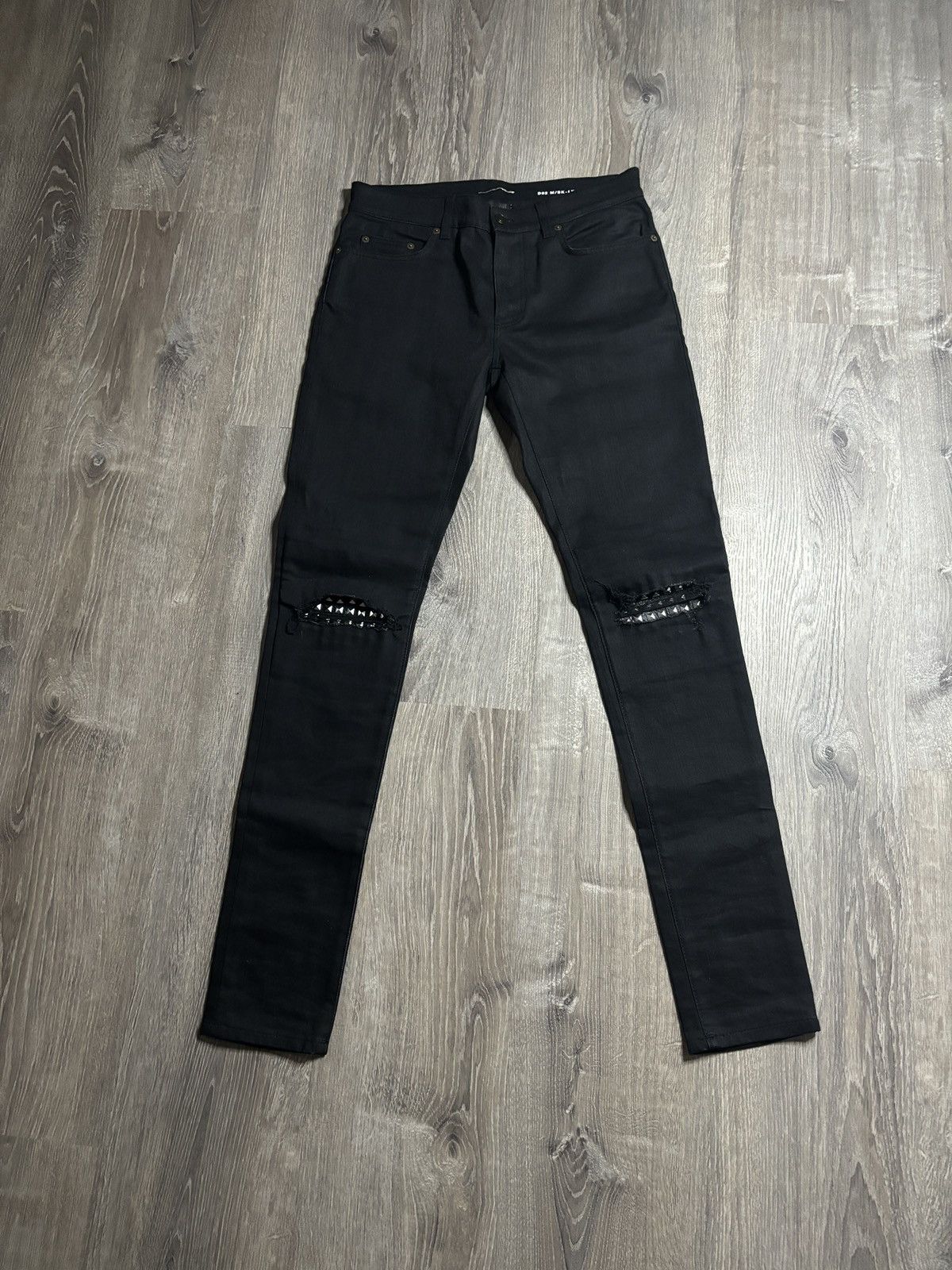 Saint laurent studded jeans sales