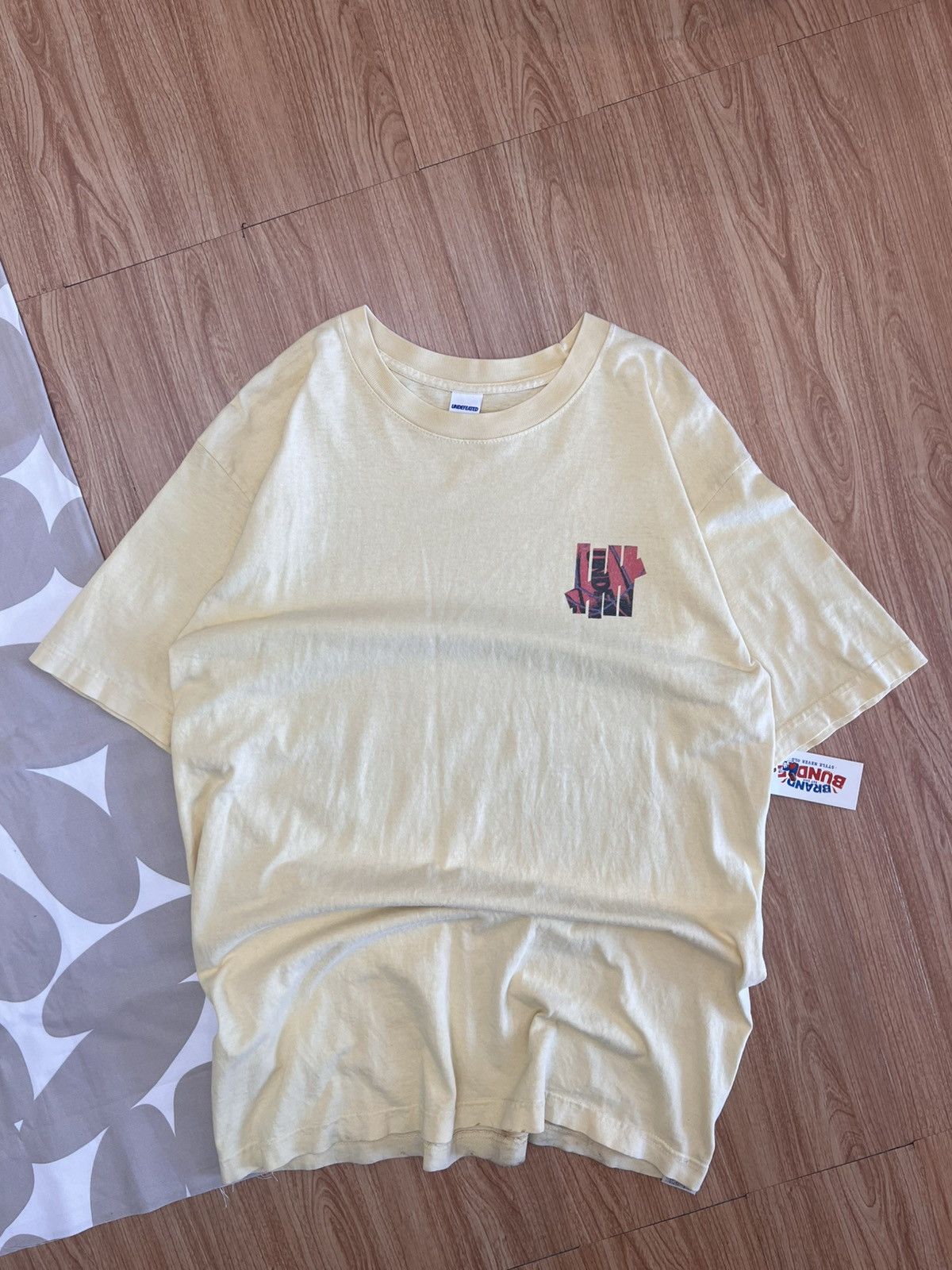 Undefeated cream-colored Undefeated basketball Size US M / EU 48-50 / 2 - 6 Thumbnail