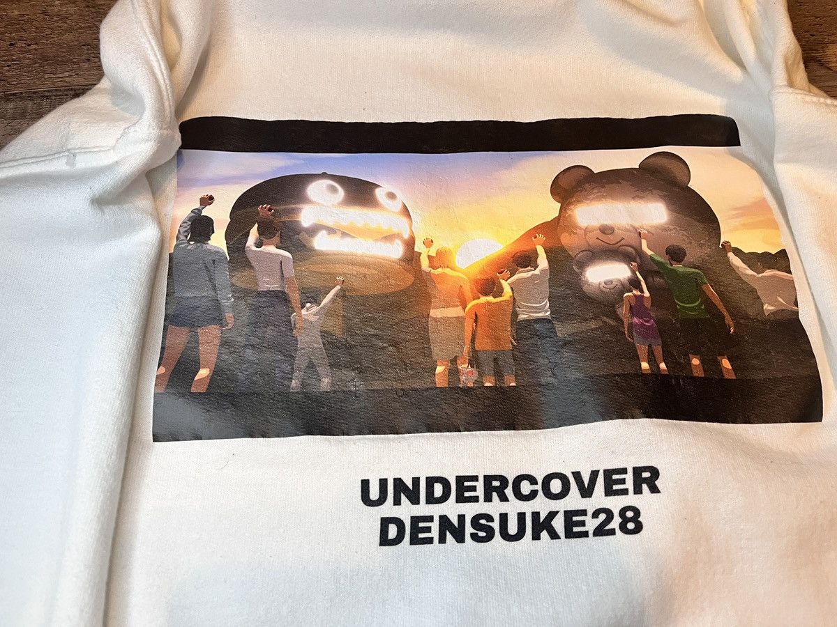 Undercover Undercover MAD Objects x Densuke28 collaboration graphic Size US S / EU 44-46 / 1 - 5 Thumbnail