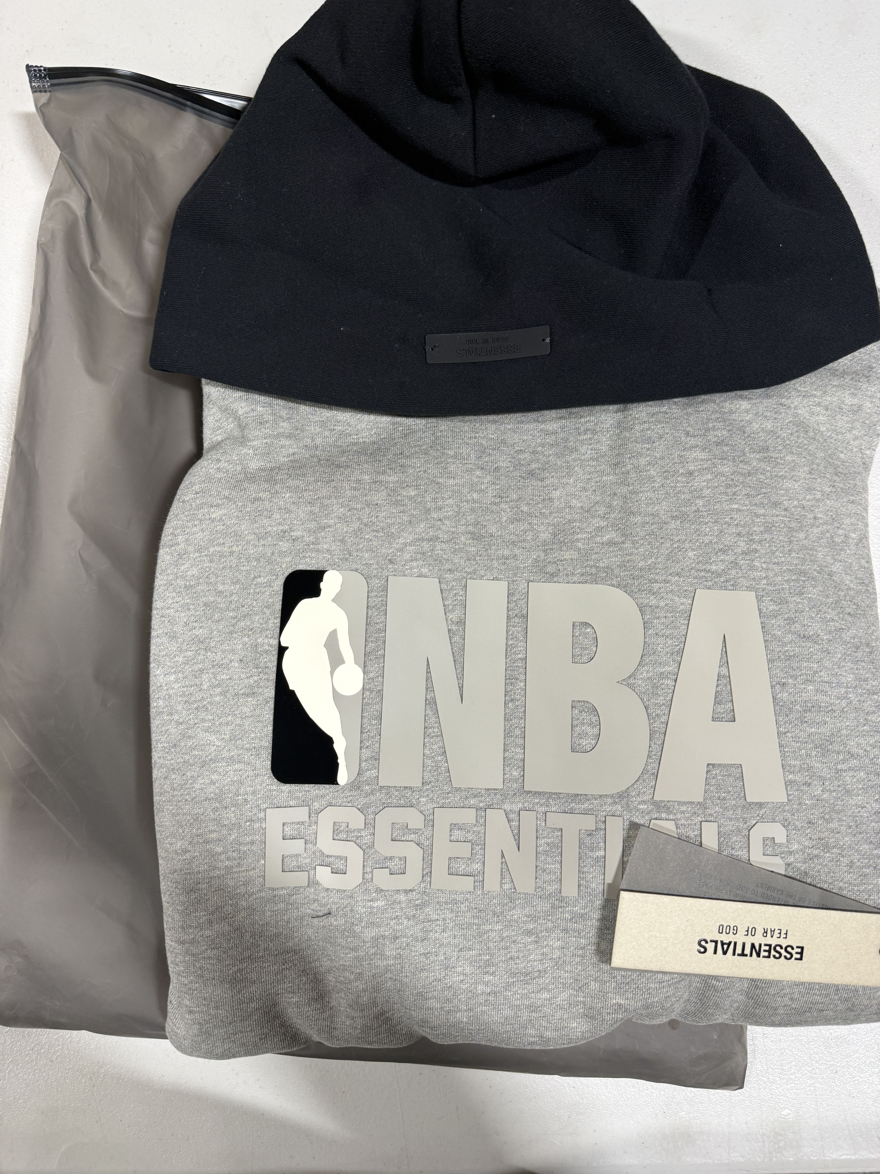 Fear of God × NBA Fear of God Essentials NBA Hoodie Warm Heather/Black XS Size US XS / EU 42 / 0 - 4 Thumbnail