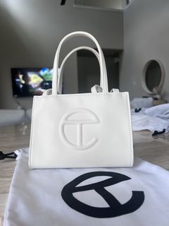 My fiancé rocking her small white Telfar bag. : r/Telfar