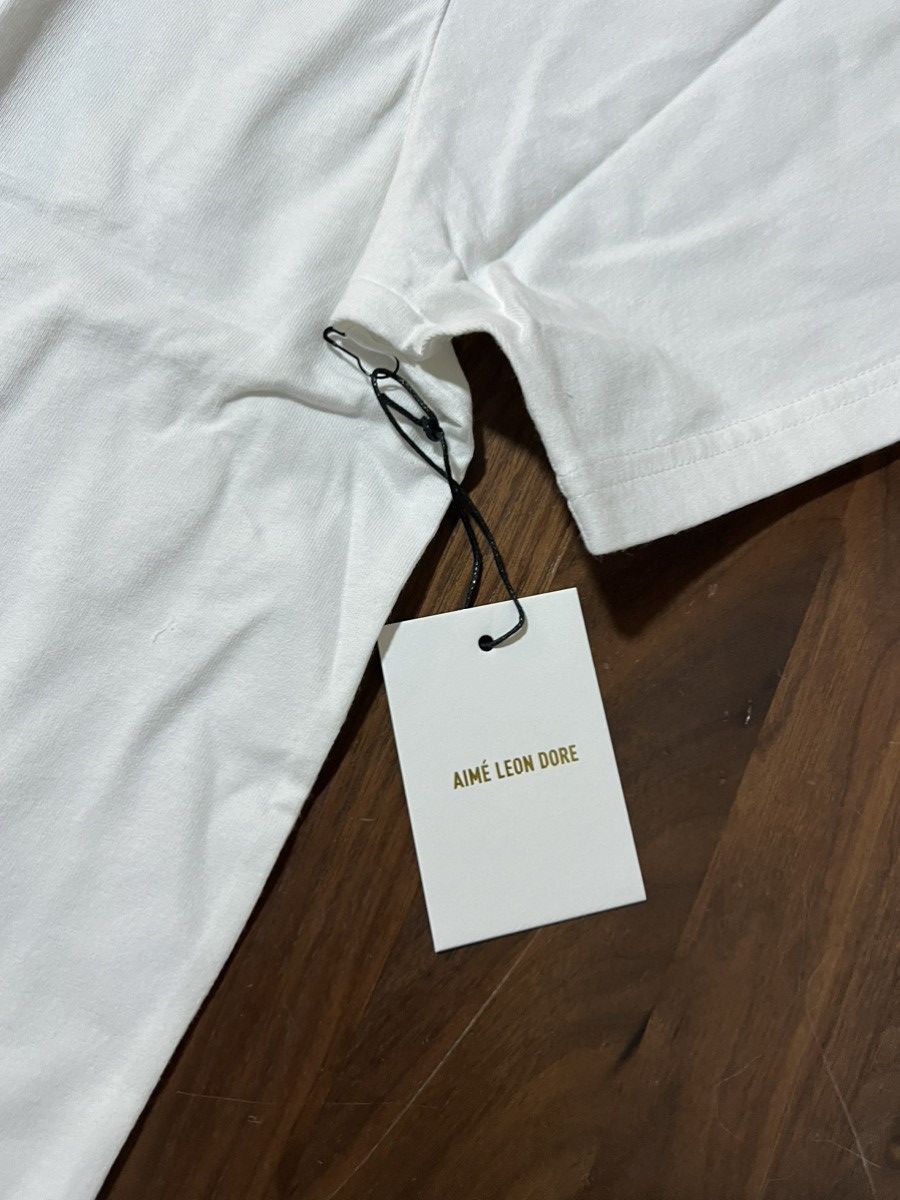 Aime Leon Dore Aime Leon Dore ALD Basketball Boards Olympic Games Tee XL Size US XL / EU 56 / 4 - 6 Thumbnail