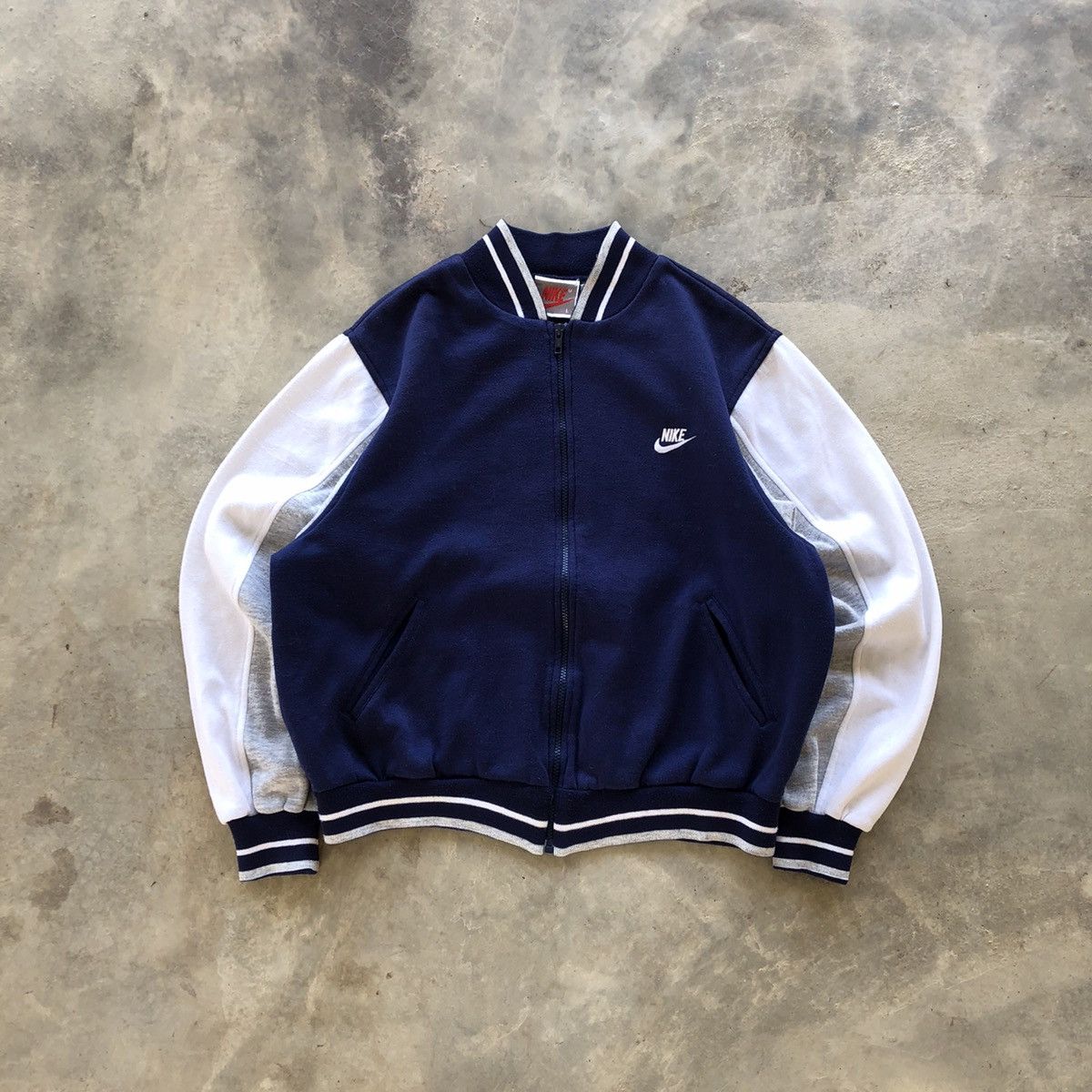 image of Nike Small Swoosh Cotton Varsity Jacket in Navy, Men's (Size Large)