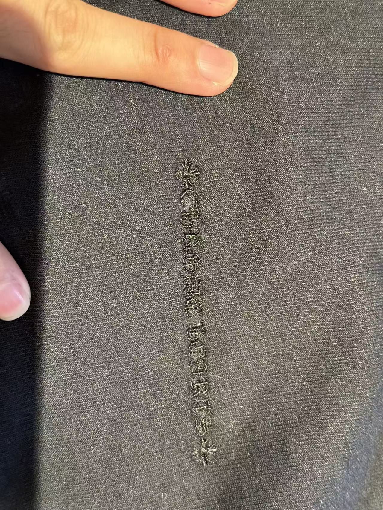 Leather cross patch crewneck sweatshirt