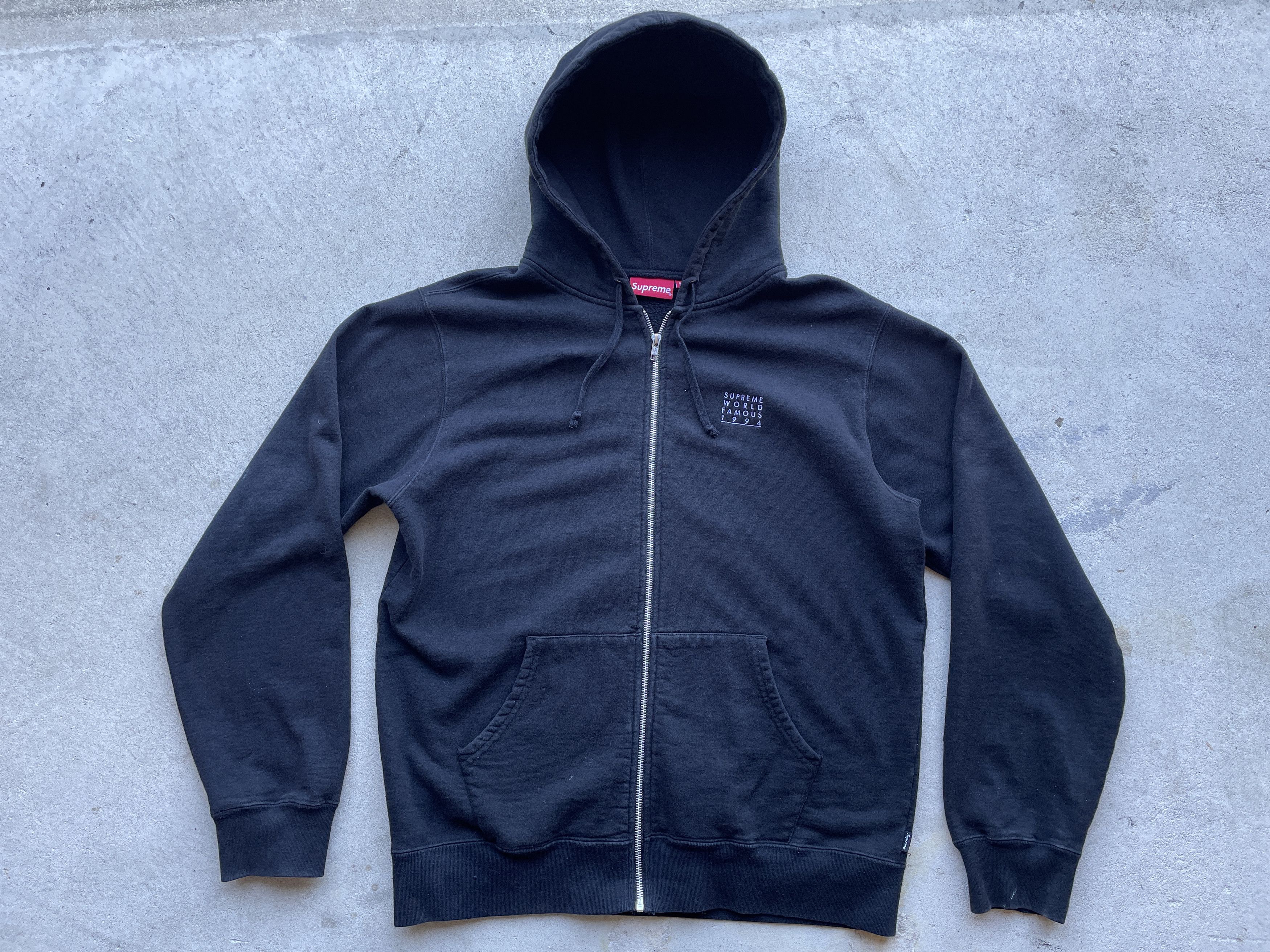 Supreme world famous zip up hooded sweatshirt 2025