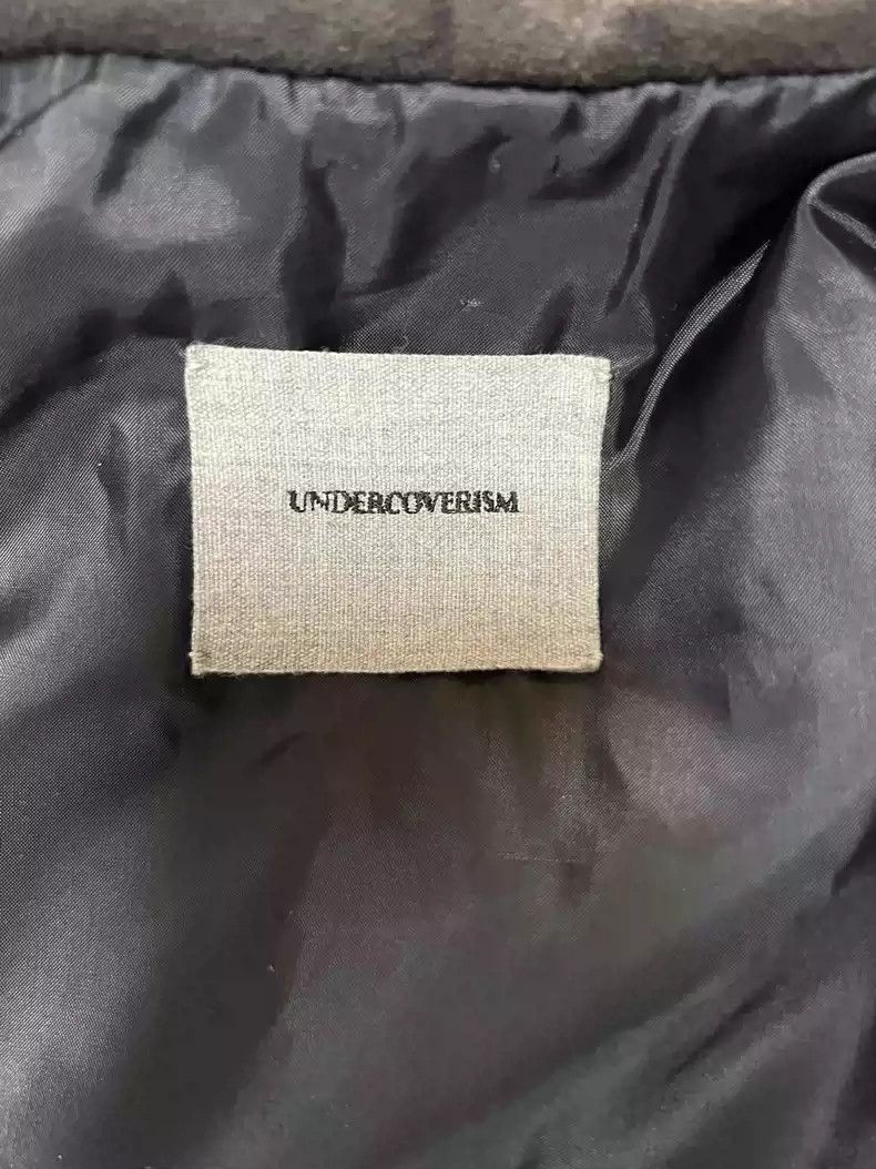 Undercover12ss She brings the rain leather