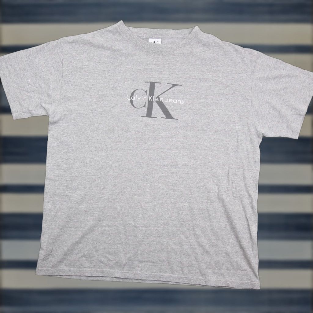 Calvin Klein VINTAGE Calvin Klein Mens Small/Medium Graphic Spellout T Shirt Grey Size US M / EU 48-50 / 2 - 1 Thumbnail