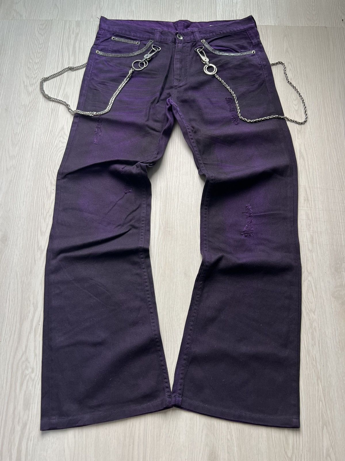 Semantic Design Whiskered Clawmark Distressed Flared Jeans