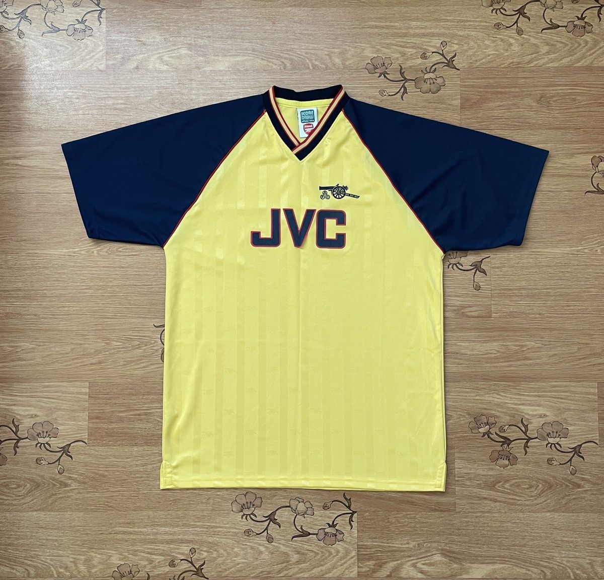 Arsenal jvc shirt yellow deals