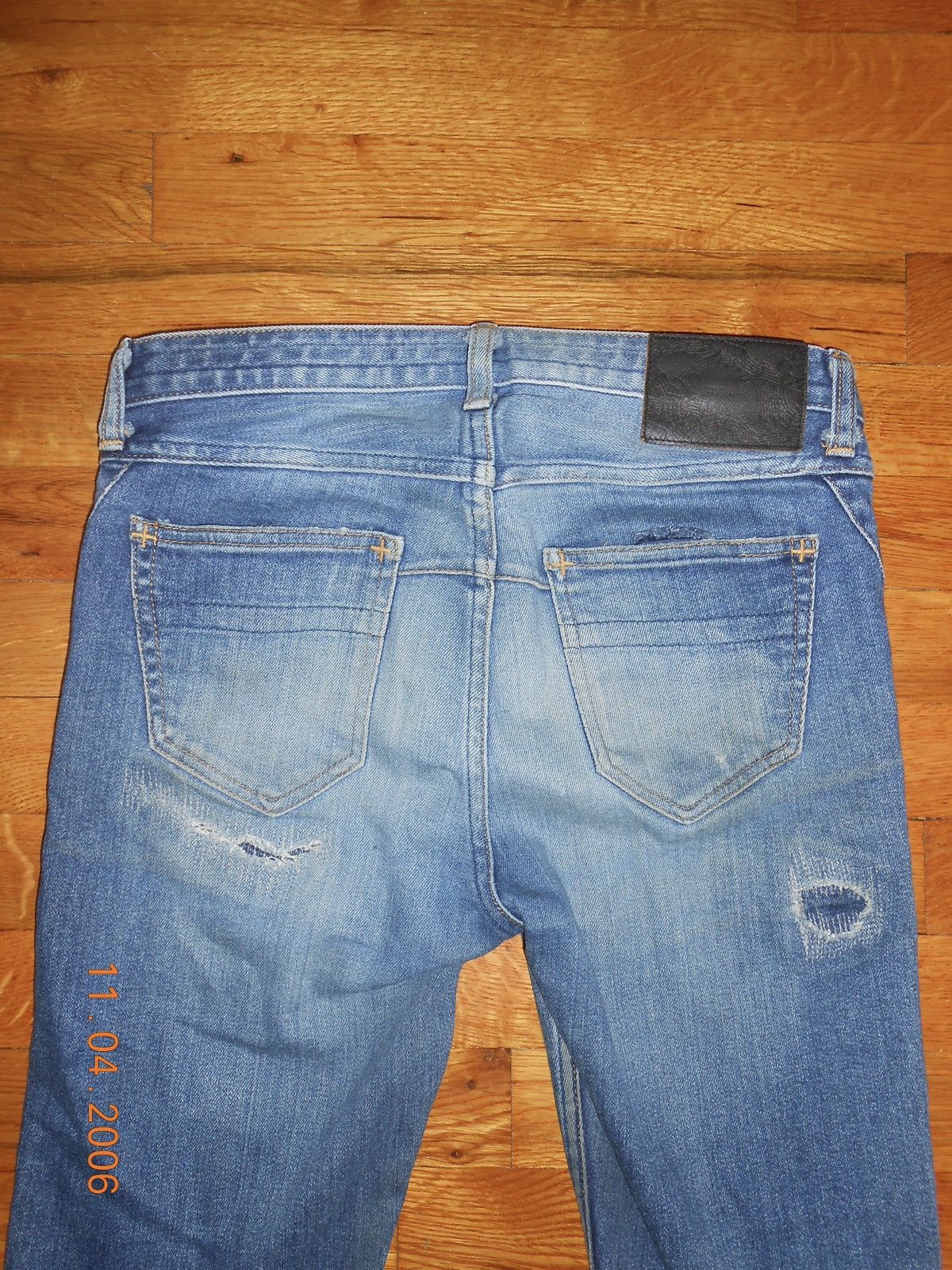 number (n)ine distressed repair denim