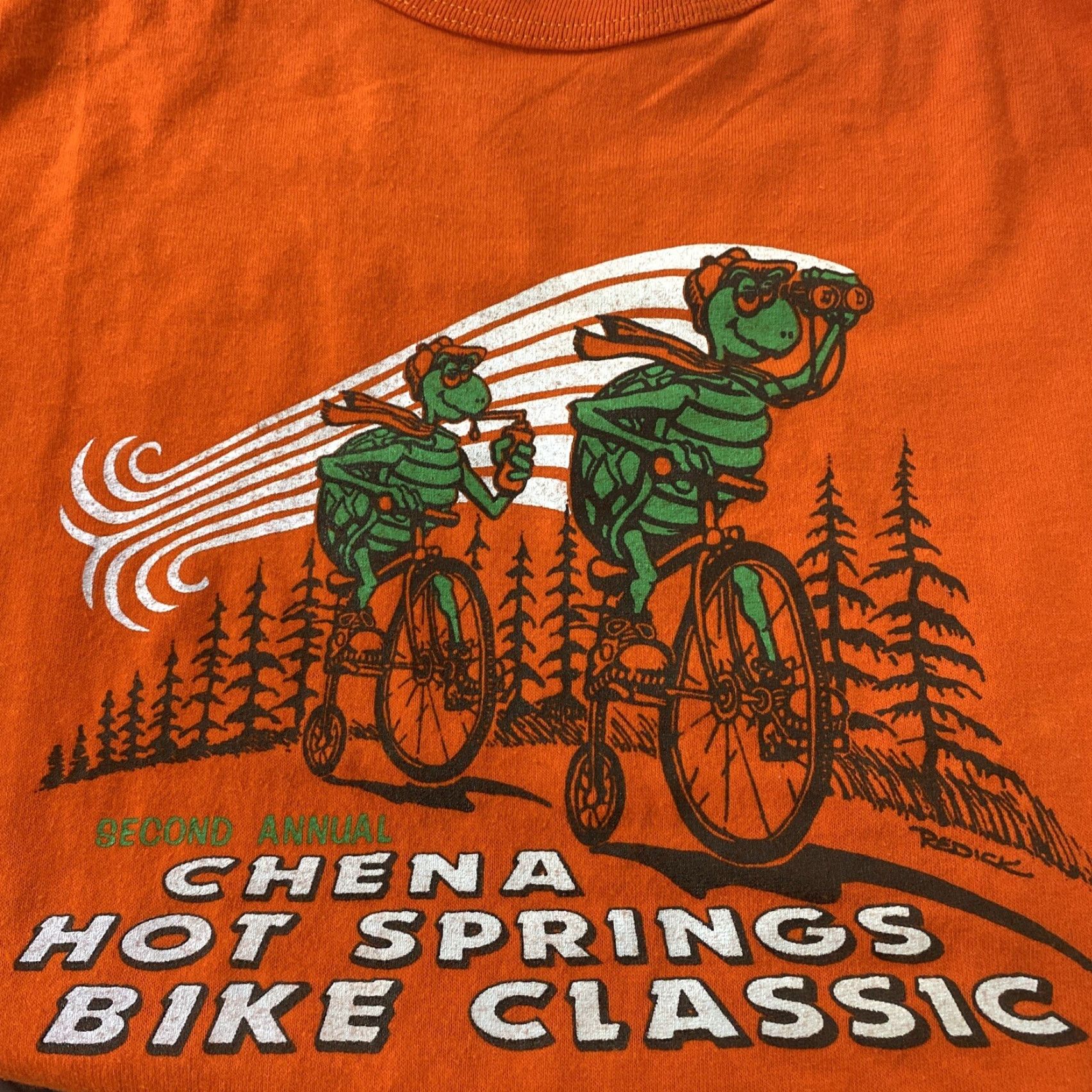 Russell Athletic VINTAGE Men’s M T-Shirt Orange Chena Hot Springs Bike Classic Turtles USA 1980s Redick Art Mens Newrch Sleeve Short Cotton Blend White? Size US M / EU 48-50 / 2 - 3 Thumbnail