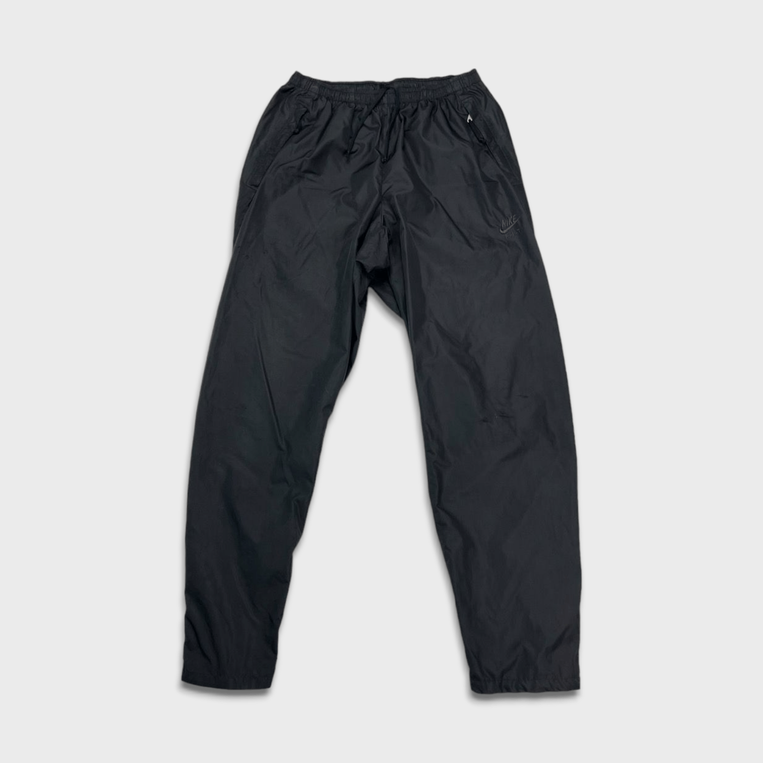 image of Vintage 90's Nike Acg Large 28X31 Swoosh Spellout Track Pants in Black, Men's