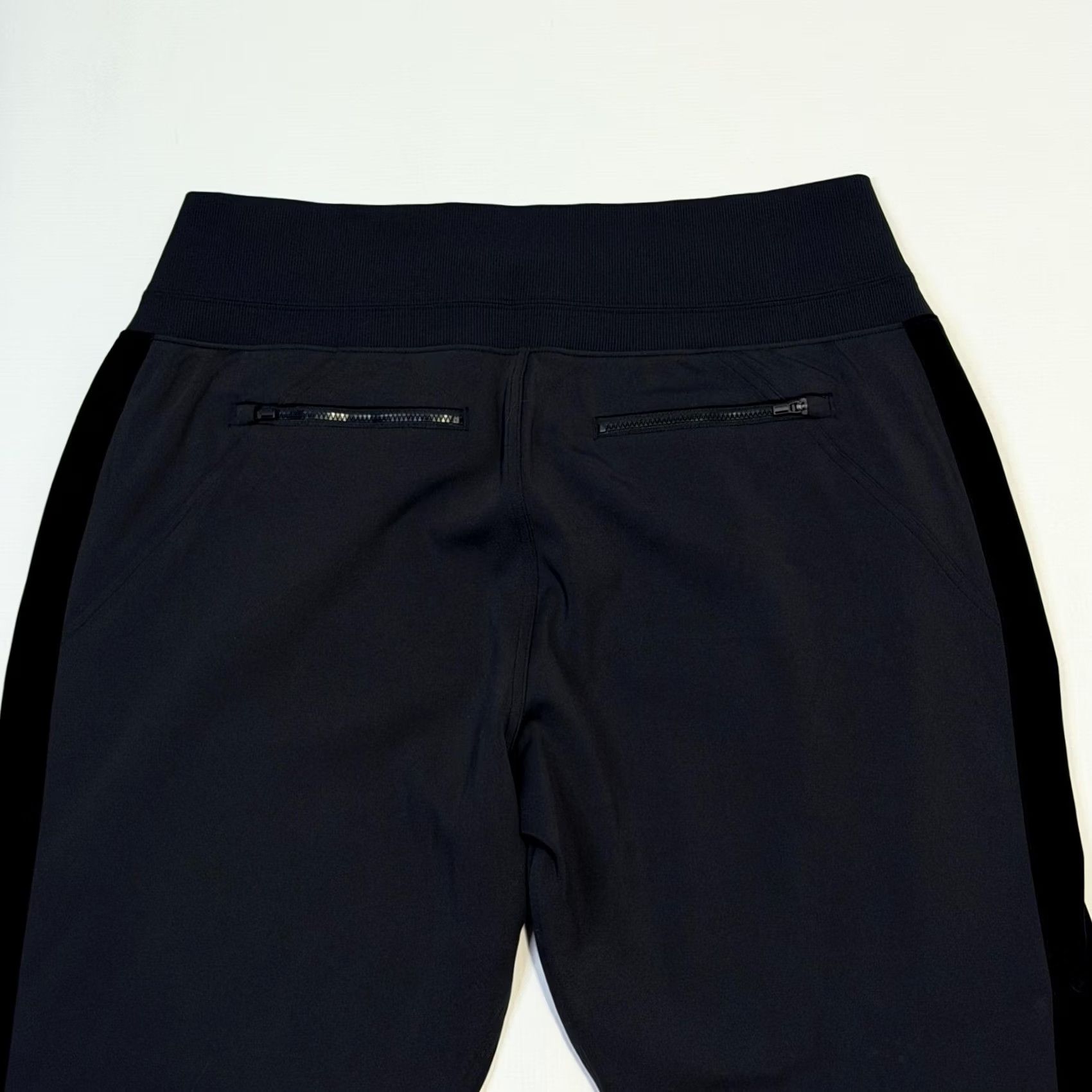 Athleta ATHLETA Women Jogger Black High Rise Rib Waist Pockets Zip Pocket Tapered 27in Inseam XS-XL Activewear Jogger Womens Size 40" / US 18 - 6 Thumbnail