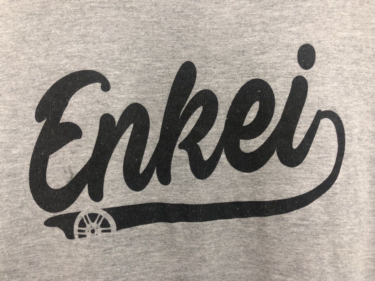 Japanese Brand × Sports Specialties ENKEI RPF1 #67 RACING PERFORMANCE WHEELS JDM STYLE PROMO TEE Size US L / EU 52-54 / 3 - 6 Thumbnail