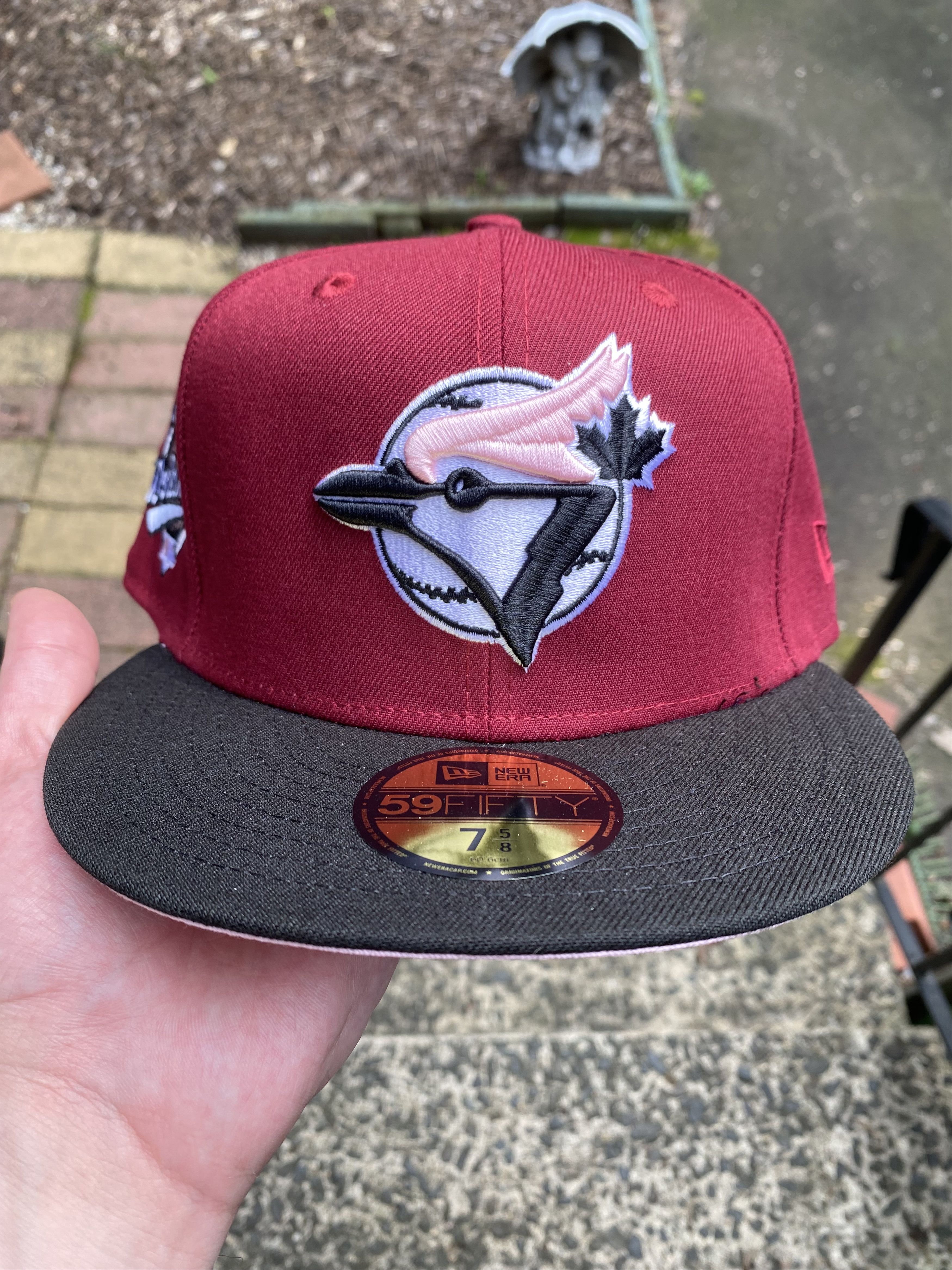 Burgundy Toronto shops blue jays New Era with pink brim.