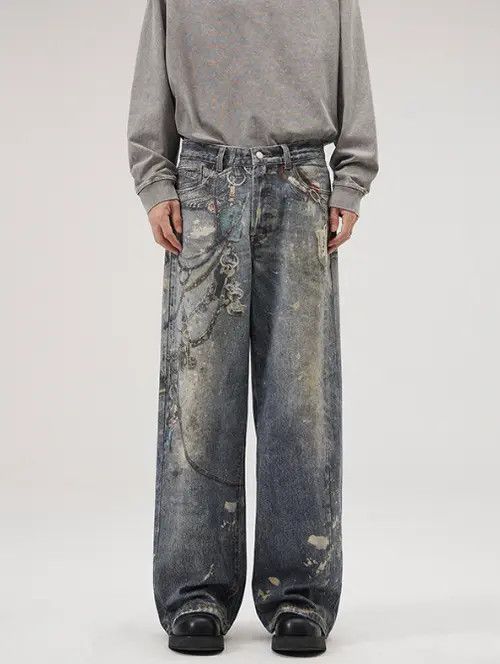 Blue washed distressed ink-splatter tie-dye straight jeans