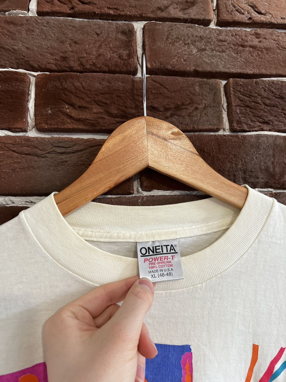 Vintage Vintage 1990s ONEITA Andrew Carson Biking Single Stitch Tee Size US XL / EU 56 / 4 - 7 Thumbnail