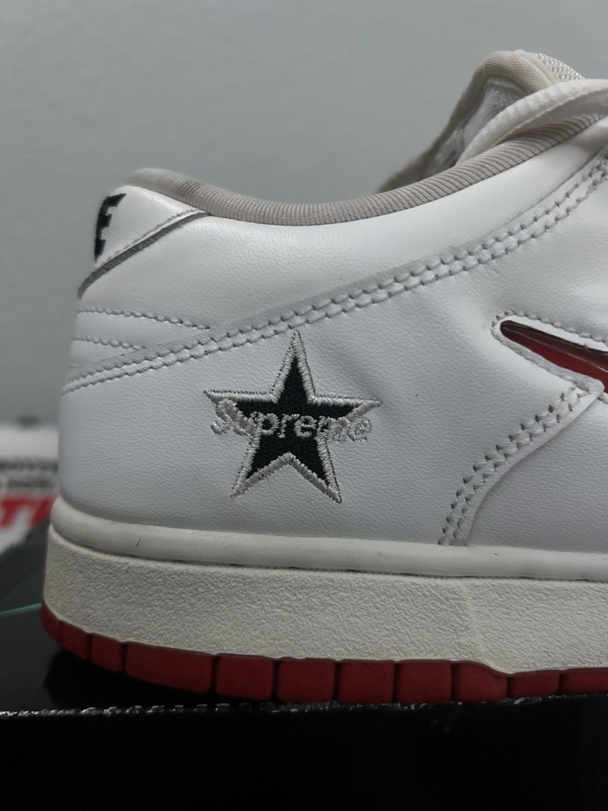 Supreme x Nike Dunk SB Low Varsity red